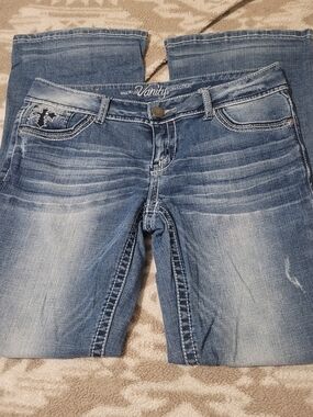 Vanity Medium Blue Bootcut Jeans with Whiskering